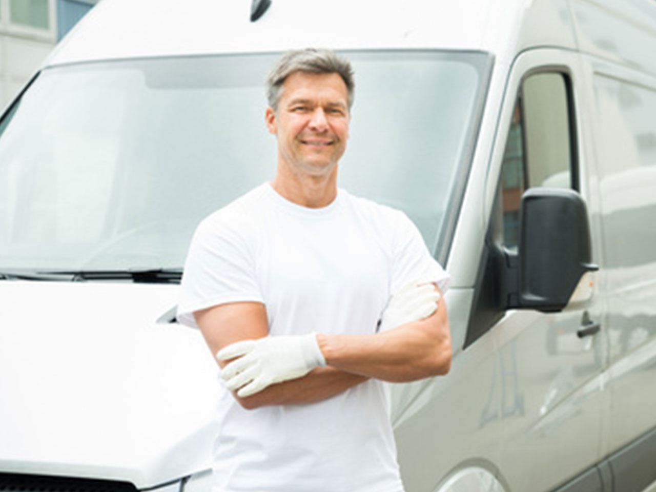 2. Painter-With-Arms-Crossed-In-Front-Of-Van